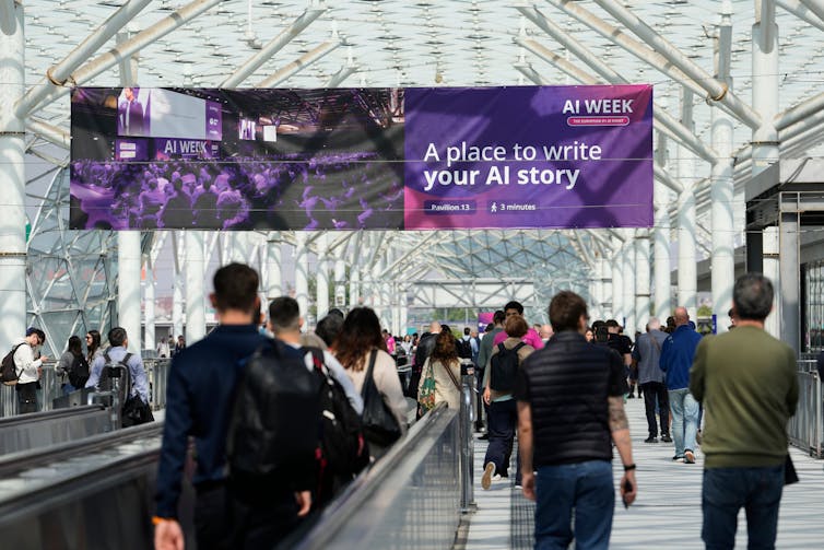 people under a sign about writing your AI story