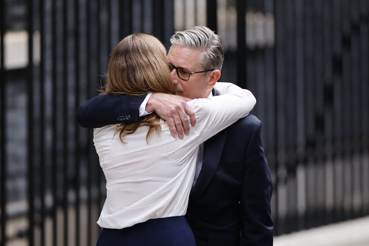 keir starmer hugs his wife victoria immediately after delivering his resignation speech.