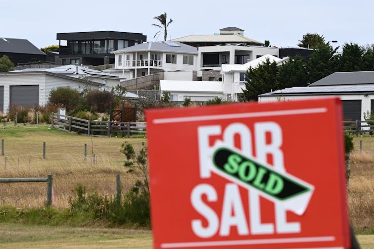 A general view of new houses and land for sale at a housing development.