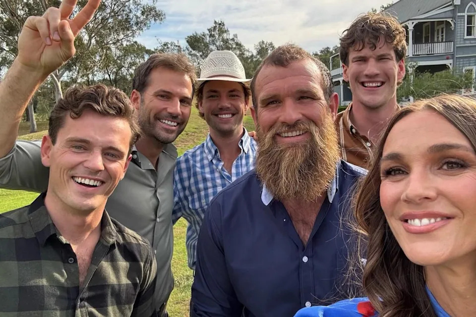 All five farmers shared a kiss with a lucky lady in Tuesday's episode.