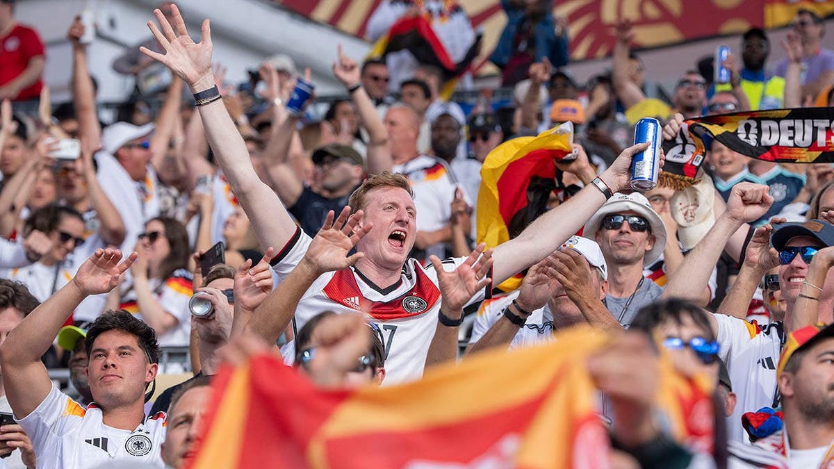 Fans of Germany cheering during a FIFA World Cup match at Toronto Stadium.