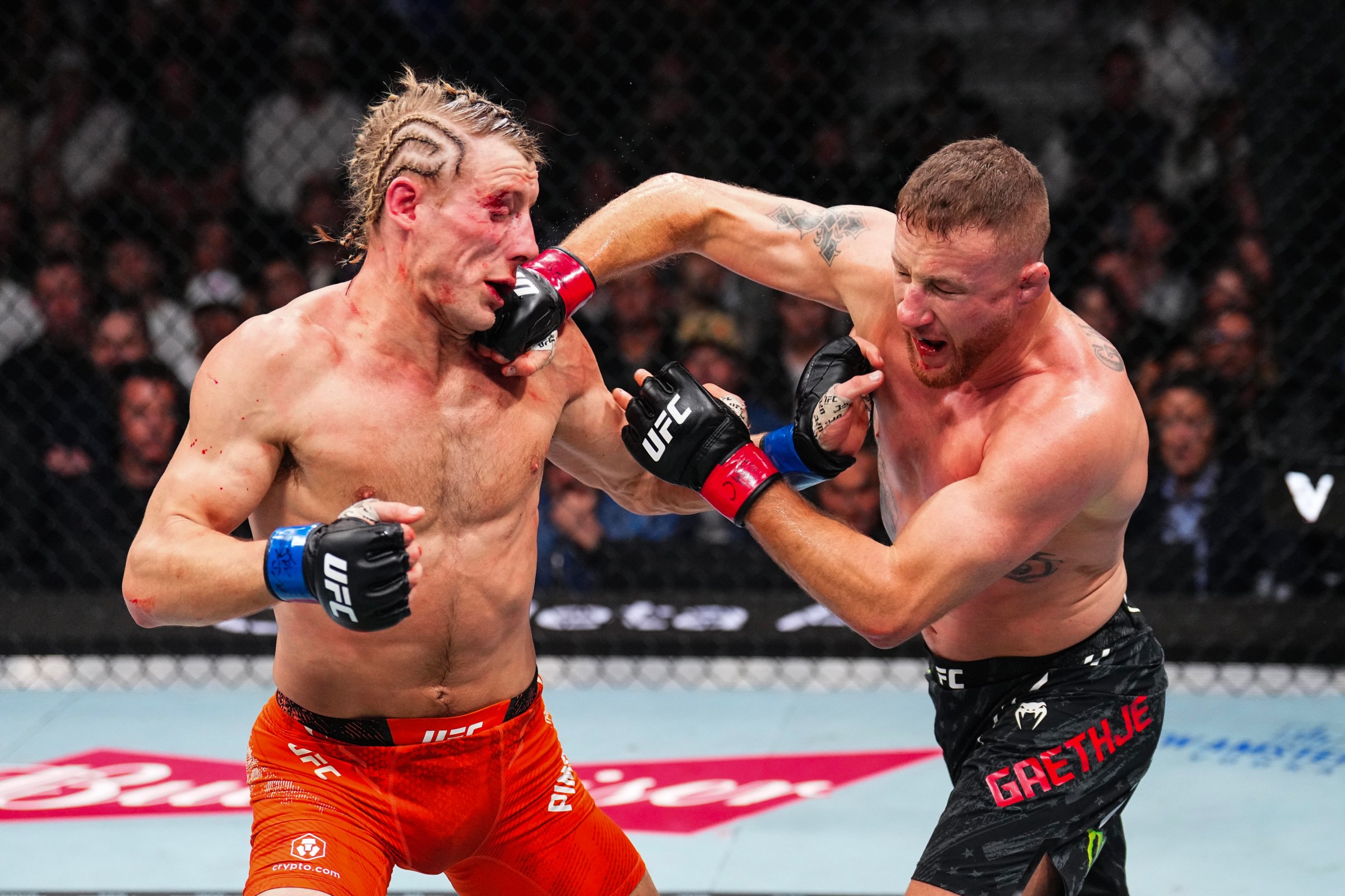 LAS VEGAS, NEVADA - JANUARY 24: (R-L) Justin Gaethje punches Paddy Pimblett of England in the UFC lightweight interim championship bout during the UFC 324 event at T-Mobile Arena on January 24, 2026 in Las Vegas, Nevada. (Photo by Chris Unger/Zuffa LLC)