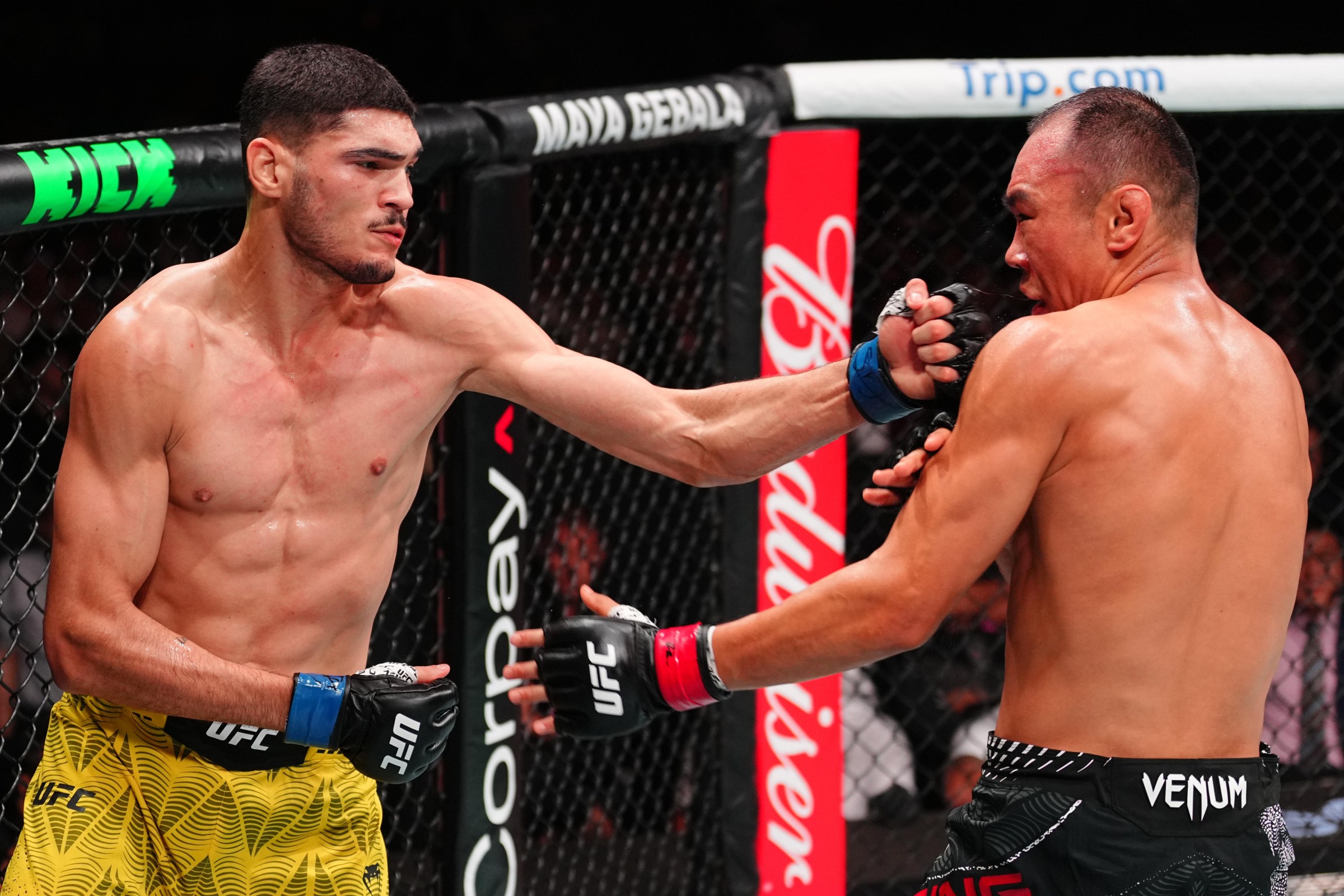 MACAU, CHINA - MAY 30: (L-R) Jose Souza of Brazil punches Ding Meng of China in a welterweight fight during the UFC Fight Night event at Galaxy Arena on May 30, 2026 in Macau, China. (Photo by Jeff Bottari/Zuffa LLC)