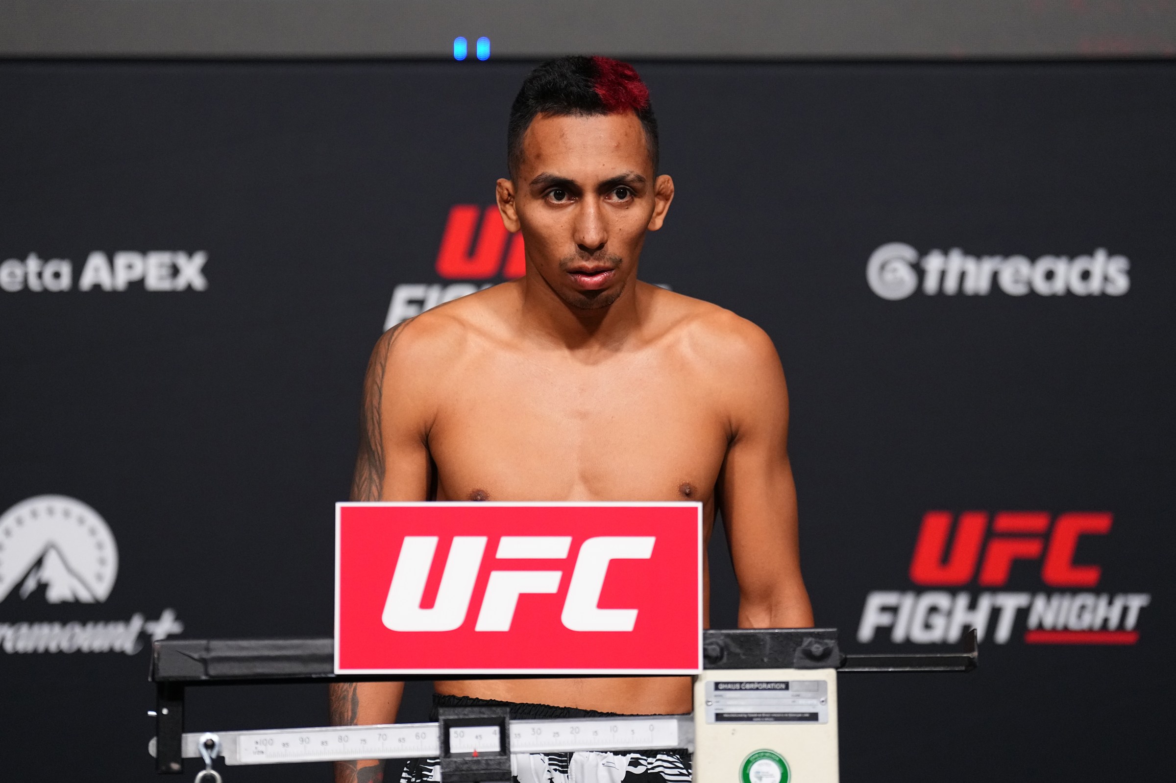 LAS VEGAS, NEVADA - JUNE 19: Kevin Borjas of Peru poses on the scale during the UFC Fight Night official weigh-ins at Meta APEX on June 19, 2026 in Las Vegas, Nevada. (Photo by Chris Unger/Zuffa LLC)