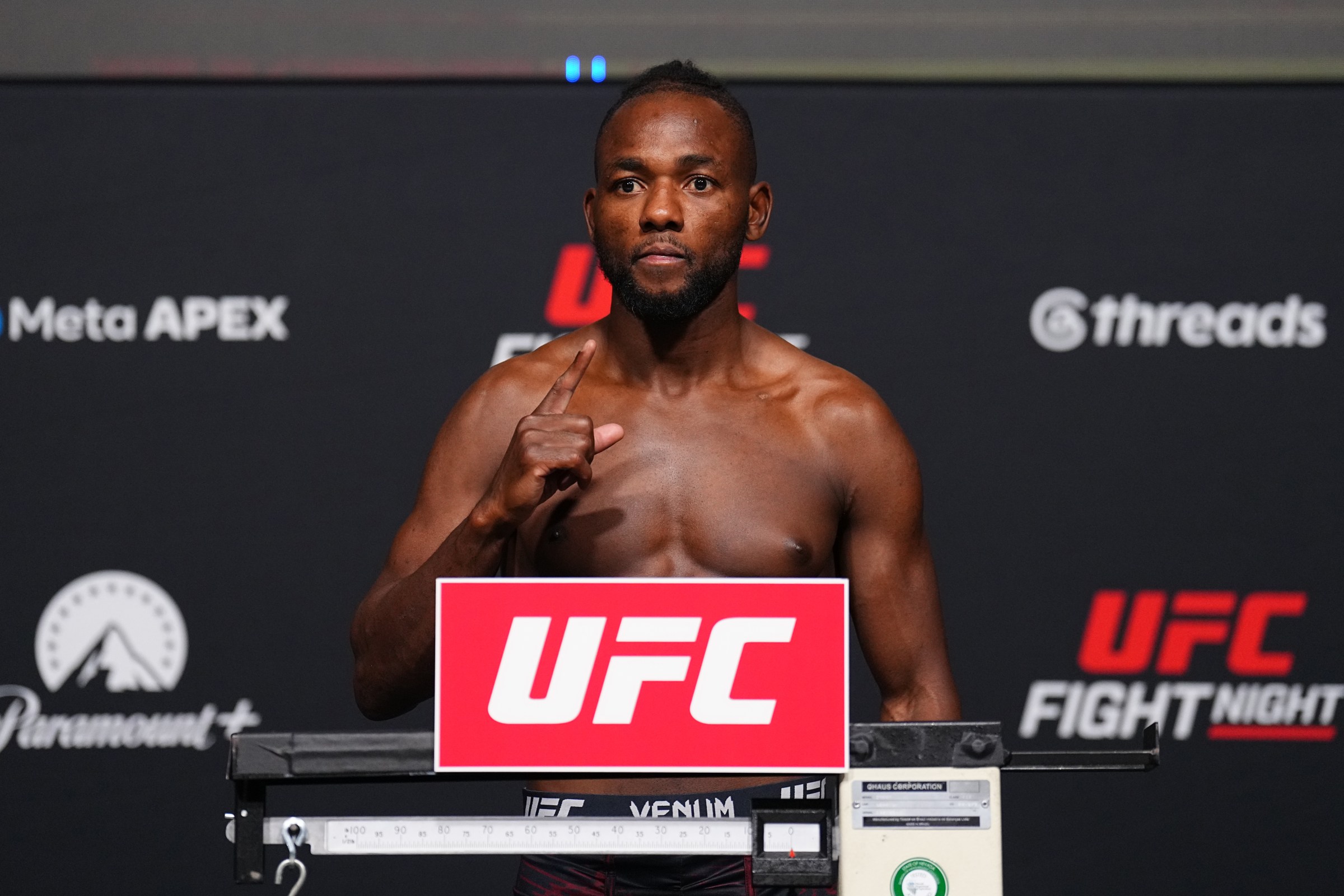 LAS VEGAS, NEVADA - JUNE 19: Manel Kape of Angola poses on the scale during the UFC Fight Night official weigh-ins at Meta APEX on June 19, 2026 in Las Vegas, Nevada. (Photo by Chris Unger/Zuffa LLC)