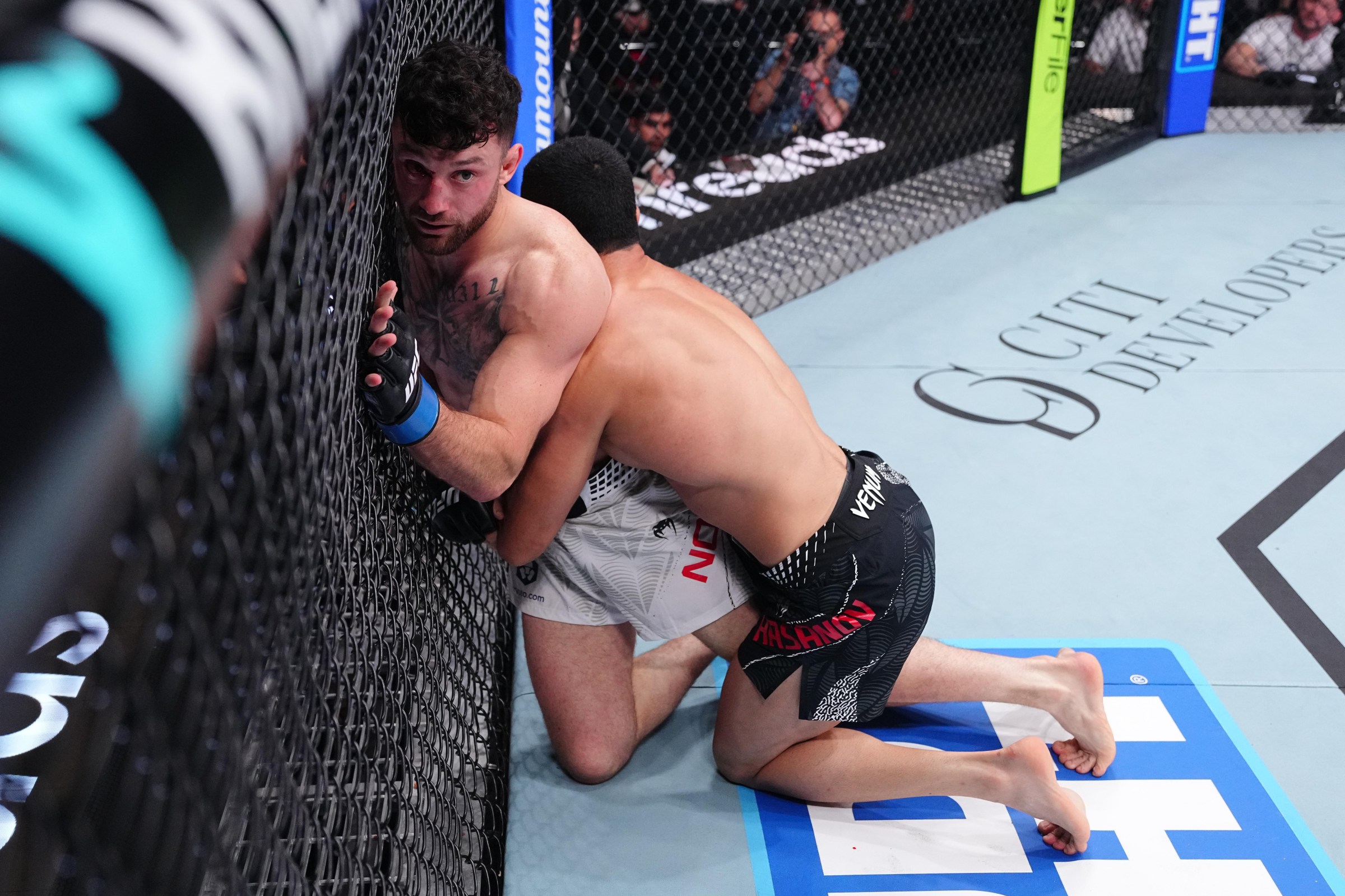 BAKU, AZERBAIJAN - JUNE 27: Farman Hasanov of Azerbaijan attempts to take down Eric Nolan in a welterweight fight during the UFC Fight Night event at National Gymnastics Arena on June 27, 2026 in Baku, Azerbaijan. (Photo by Jeff Bottari/Zuffa LLC)