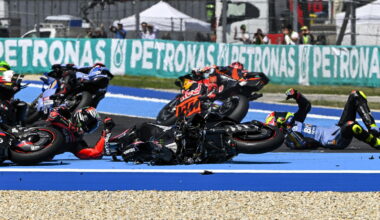 Iker Lecuona rides past while team-mate Fermin Aldeguer is caught up in Turn 1 incident, 2026 Hungarian MotoGP.