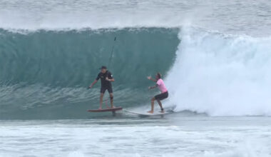 Gold Coast surfers on a wave