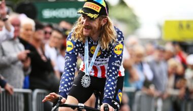 Simmons wearing the US champion's jersey with stars down his arms and long hair