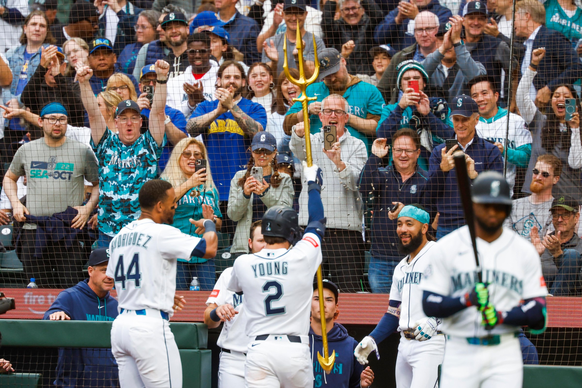Jun 29, 2026; Seattle, Washington, USA; Seattle Mariners second baseman Cole Young (2) celebrates outside of the dugout after hitting a solo-home run against the Los Angeles Angels during the third inning at T-Mobile Park. Mandatory Credit: Joe Nicholson-Imagn Images
