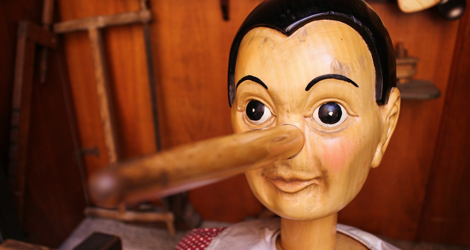 A wooden doll with a long nose that has nothing to do with Disney