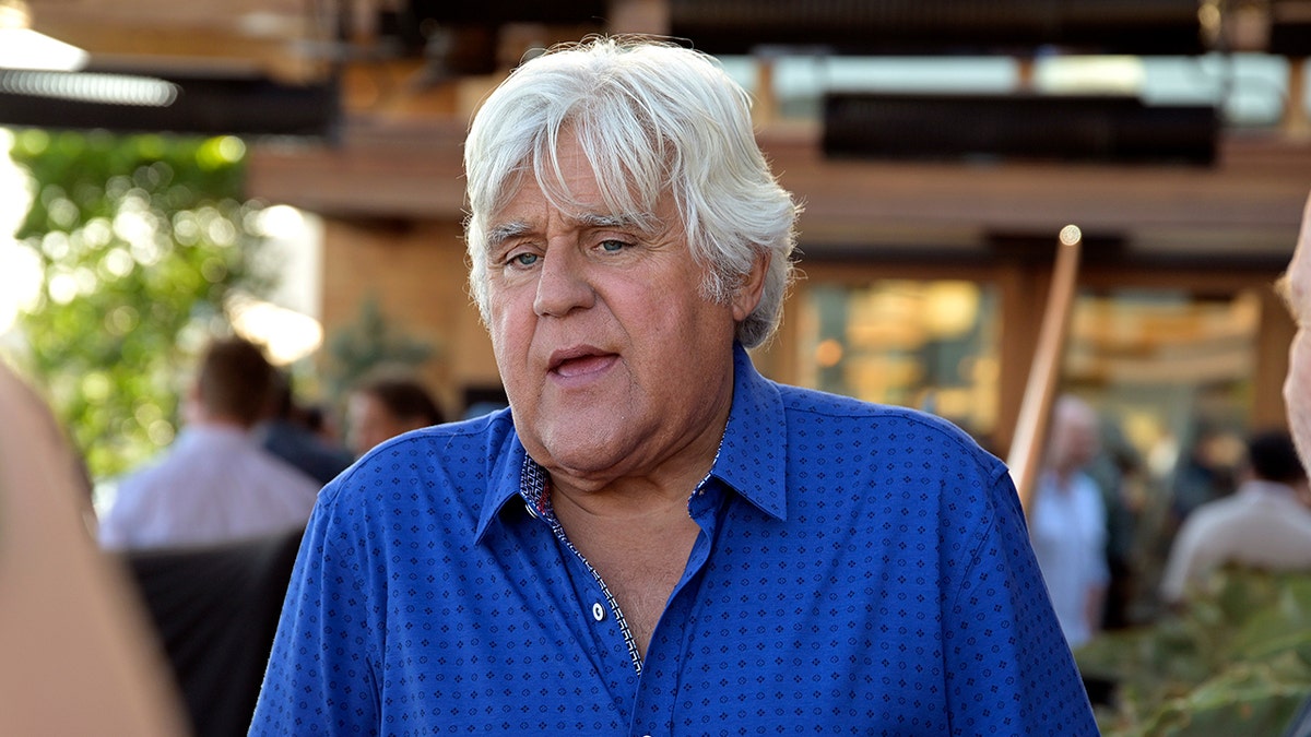 Jay Leno attending the private unveiling of the Meyers Manx electric automobile in Malibu, California.