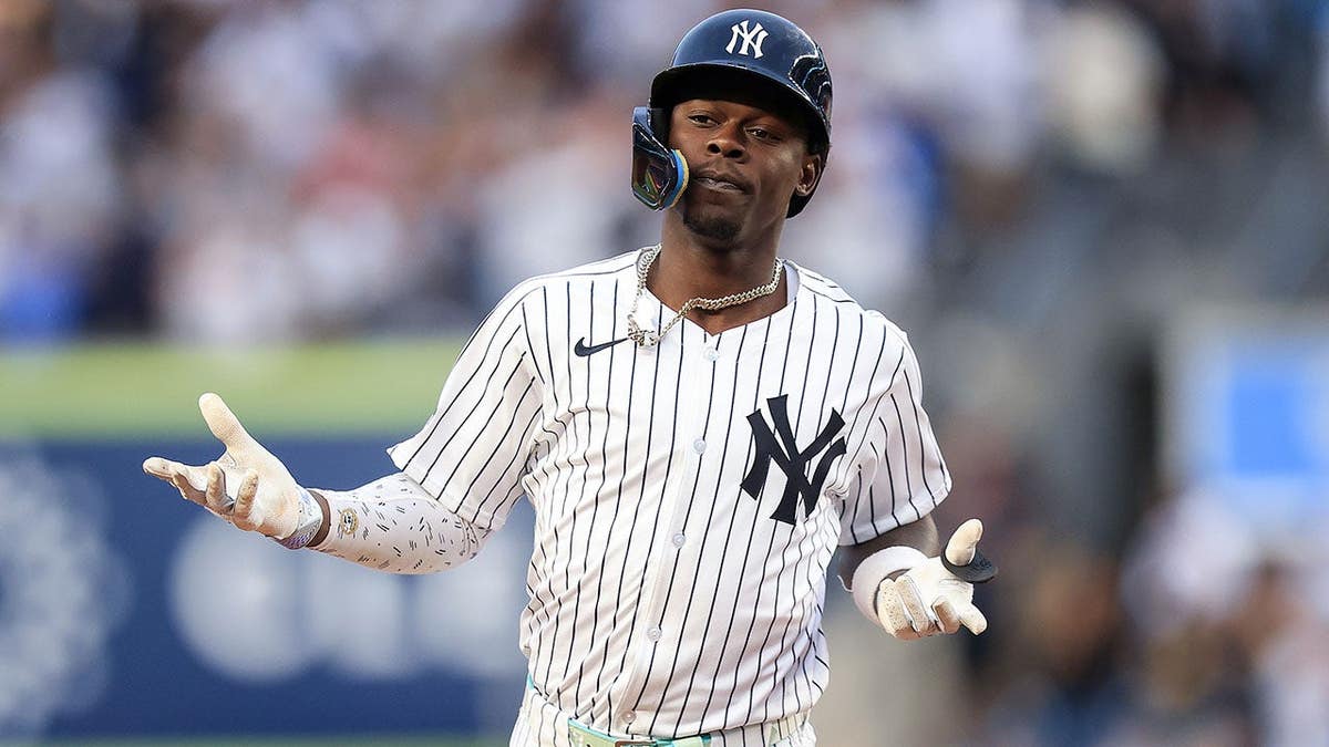 Jazz Chisholm Jr. running bases after hitting a home run at Yankee Stadium.