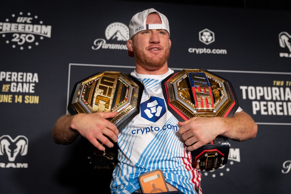 Justin Gaethje holds up his belts following a press conference with other fight winners and Dana White following UFC Freedom 250 at the JW Marriott in Washington, DC on June 15, 2026