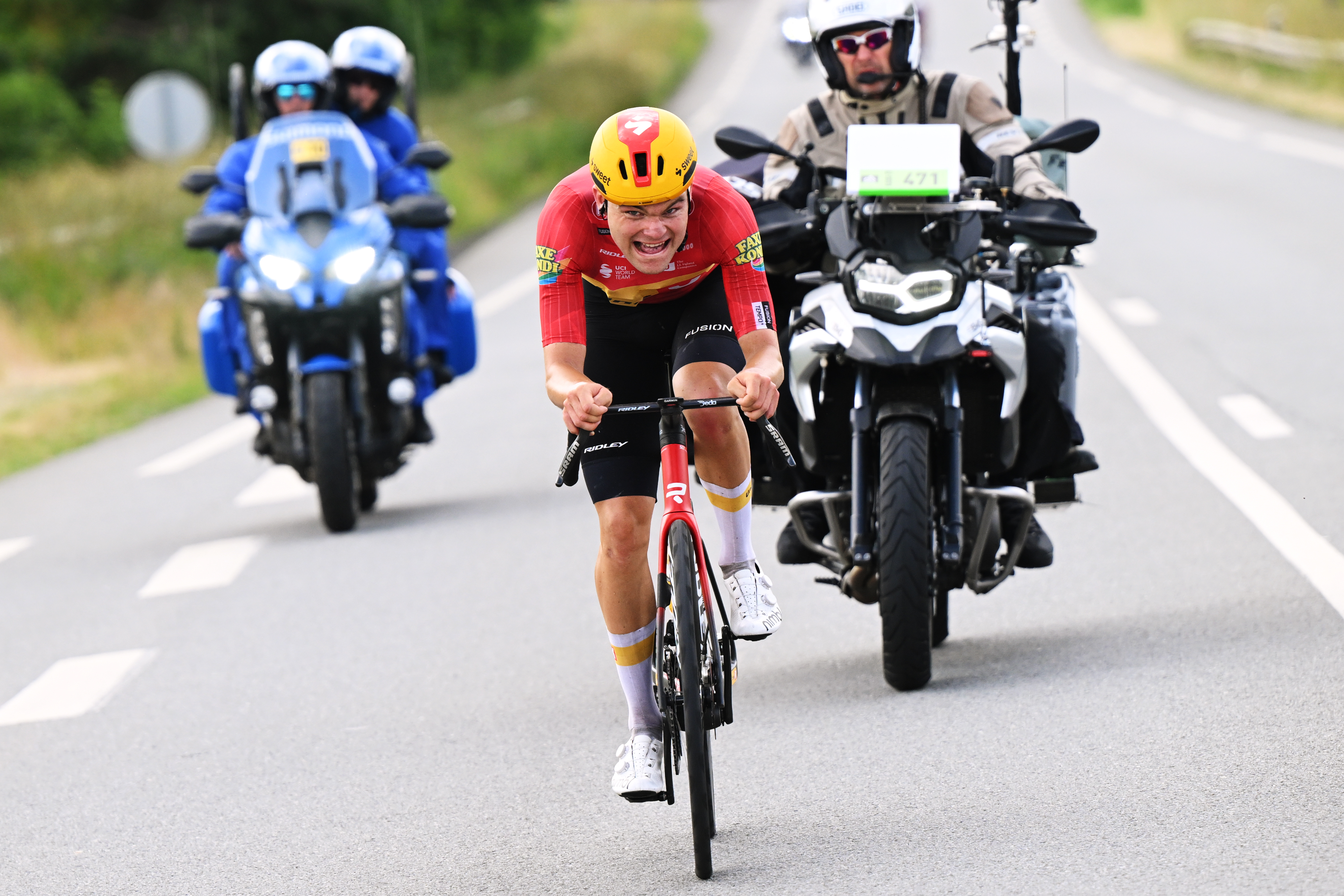 LE PUY-EN-VELAY, FRANCE - JUNE 08: Anthon Charmig of Denmark and Team Uno-X Mobility attacks in the breakaway during the 78th Tour Auvergne-Rhone-Alpes 2026, Stage 2 a 234.3km stage from Saint-Martin-le-Vinoux to Le Puy-en-Velay 624m / #UCIWT / on June 08, 2026 in Le Puy-en-Velay, France. (Photo by Dario Belingheri/Getty Images)
