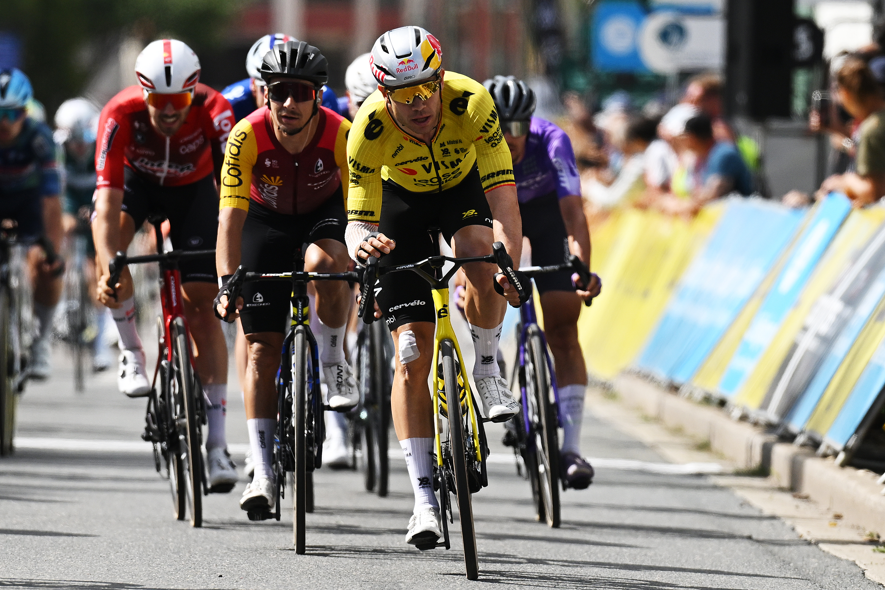 MONTROND-LES-BAINS, FRANCE - JUNE 10: (L-R) Bryan Coquard of France and Team Cofidis and Wout van Aert of Belgium and Team Visma | Lease a Bike cross the finish line during the 78th Tour Auvergne-Rhone-Alpes 2026, Stage 4 a 167.4km stage from Le Puy-en-Velay to Montrond-les-Bains / #UCIWT / on June 10, 2026 in Montrond-les-Bains, France. (Photo by Dario Belingheri/Getty Images)
