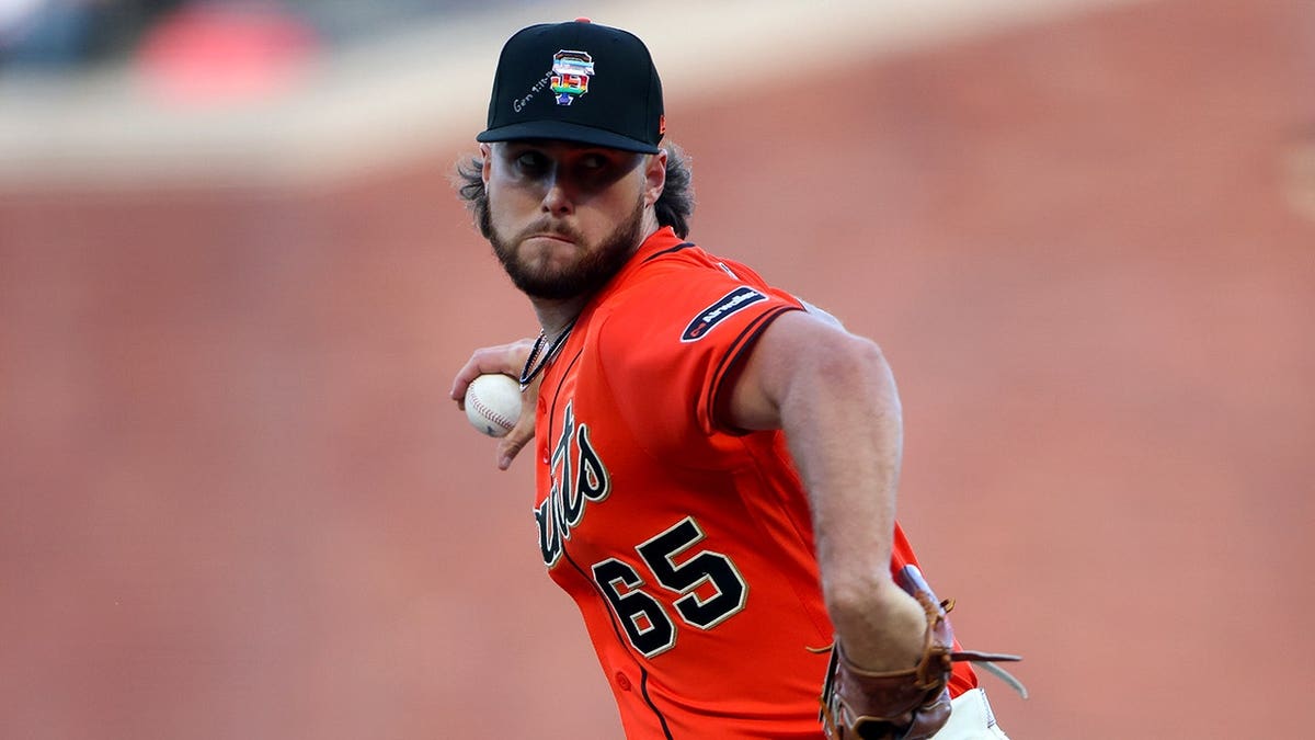 San Francisco Giants pitcher Landen Roupp throwing a pitch during a baseball game.