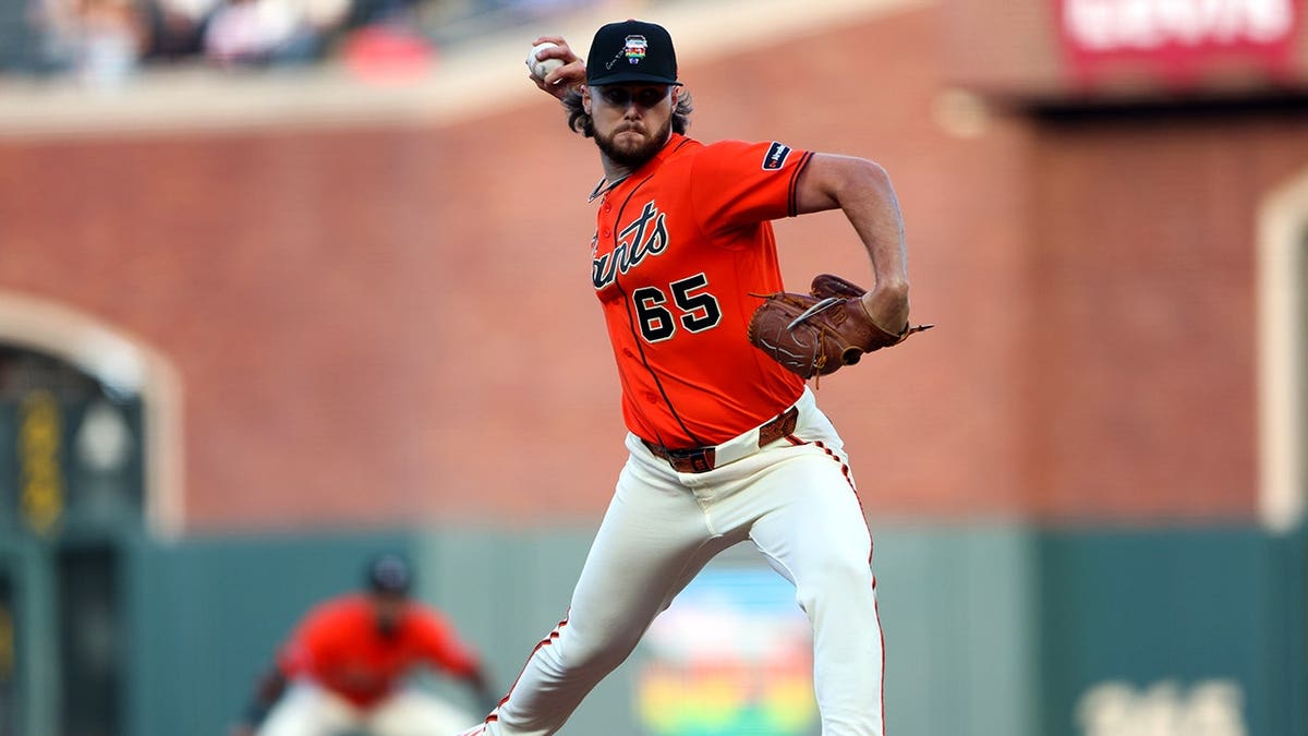 San Francisco Giants pitcher Landen Roupp throwing a pitch during a baseball game.