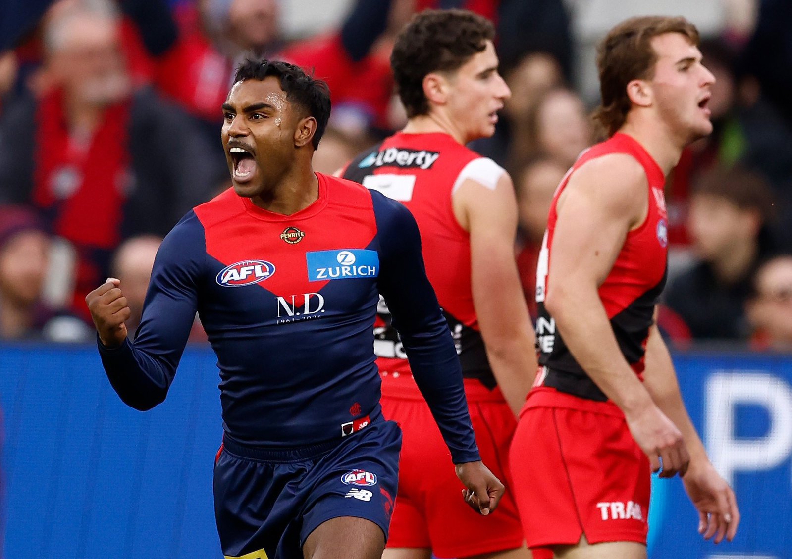 Kysaiah Pickett of the Demons celebrates a goal during the 2026 AFL Round 14 match between the Melbourne Demons and the Essendon Bombers at the Melbourne Cricket Ground on June 13, 2026 in Melbourne, Australia.