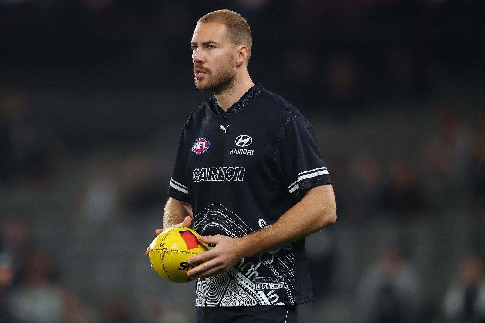 Harry McKay of the Blues warms up ahead of the round 16 AFL match between Carlton Blues and West Coast Eagles at Docklands, on June 27, 2026, in Melbourne, Australia.