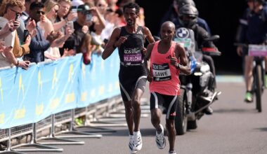 Sabastian Sawe of Team Kenya leads Yomif Kejelcha of Team Ethiopia during the Men's 2026 TCS London Marathon on April 26, 2026 in London, England.