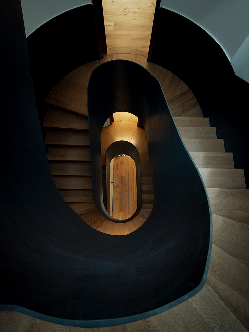 sculptural steel spiral staircase reorganizes circulation in a century-old shanghai house - 2