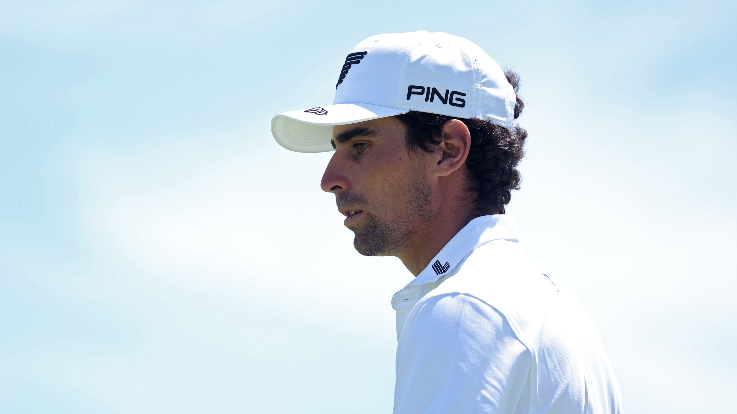 Joaquin Niemann wearing a white Ping cap and white polo shirt during the US Open