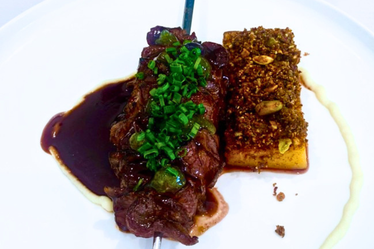 A plate of lamb skewers.