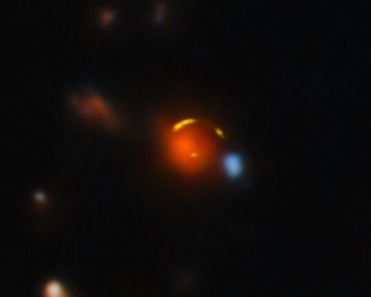 Gravitationally lensed Shadow Blaster galaxy, plus foreground galaxy