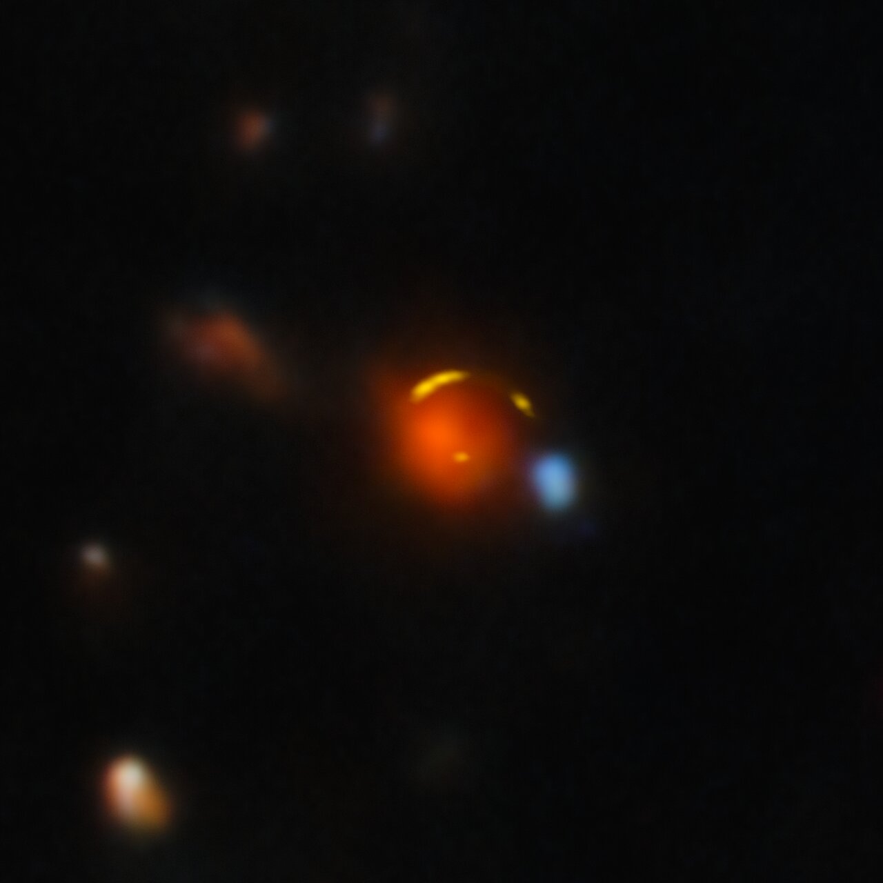 Gravitationally lensed Shadow Blaster galaxy, plus foreground galaxy