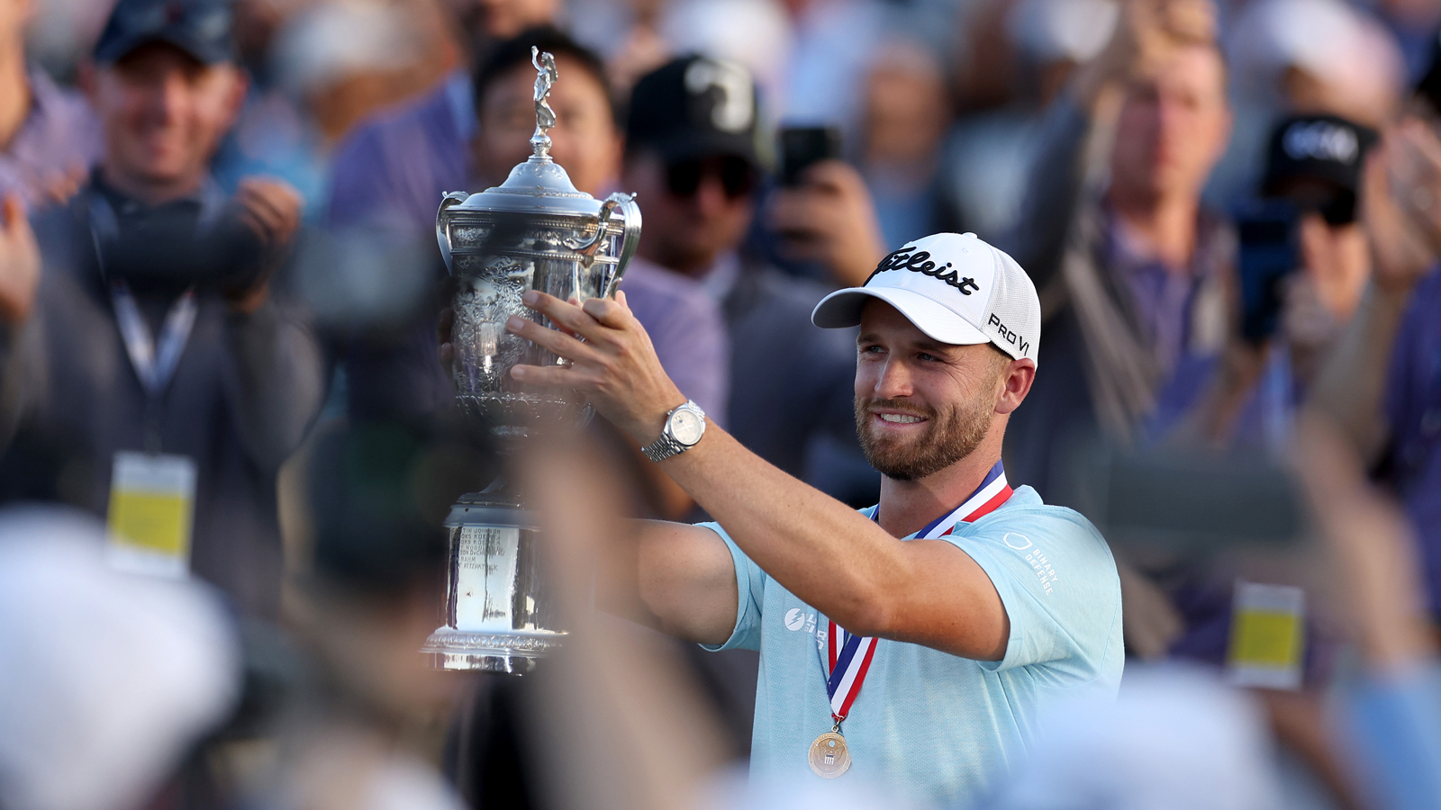 Wyndham Clark lifts the US Open trophy