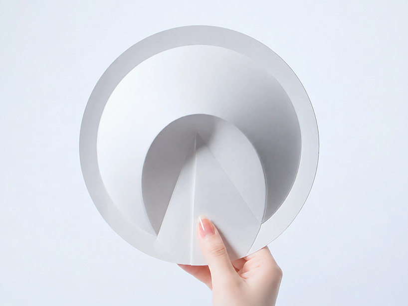 a ribless circular folded sculpture reimagines the traditional japanese paper fan - 2