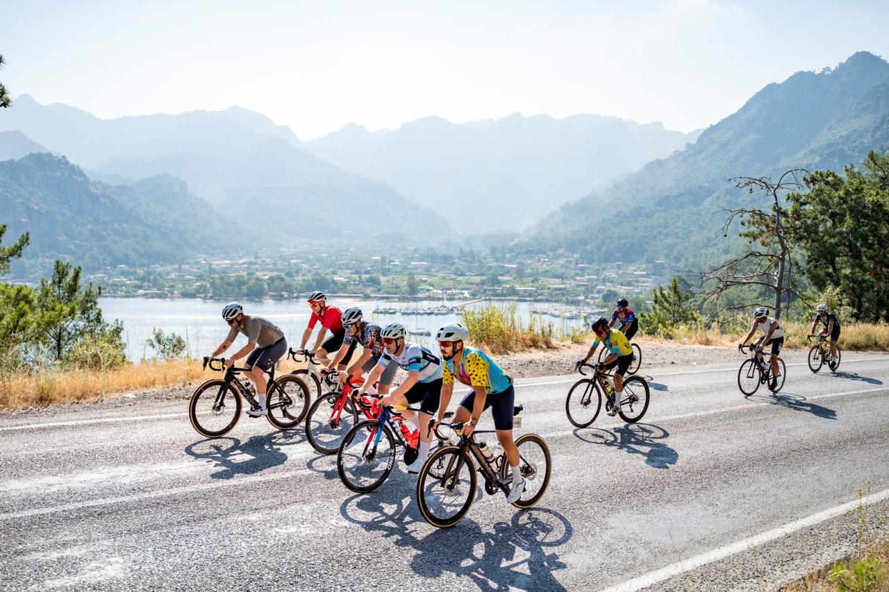 Riders take on a coastal road overlooking Marmaris during L
