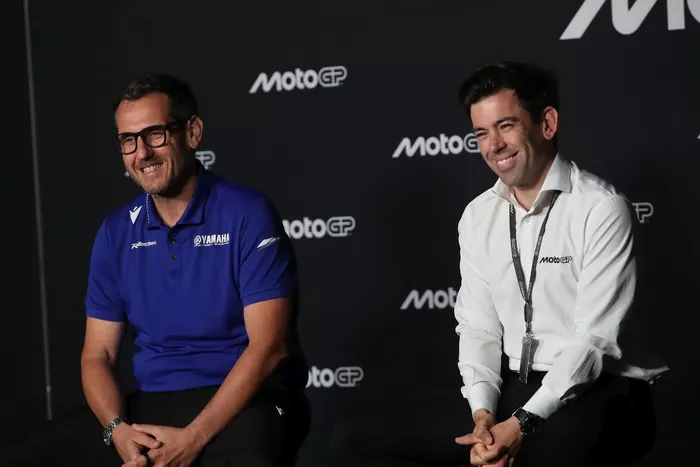 Paolo Pavesio, Managing Director of Yamaha Racing; Carlos Ezpeleta, Chief Strategy Officer of the MotoGP Sports Entertainment Group