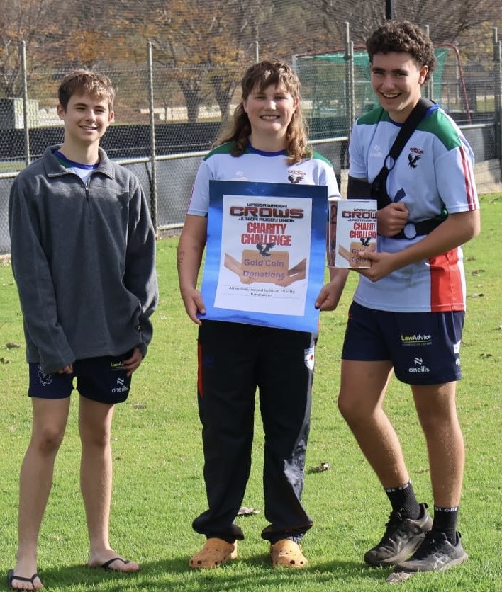 three boys raising funds