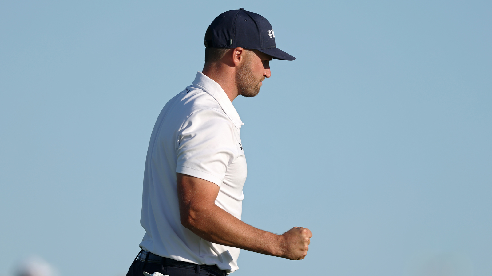 Wyndham Clark fist pumps