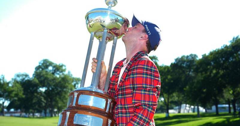 Fast finisher: Russell Henley enjoys the spoils of his Charles Schwab Challenge win in Texas. Photo: AP PHOTO