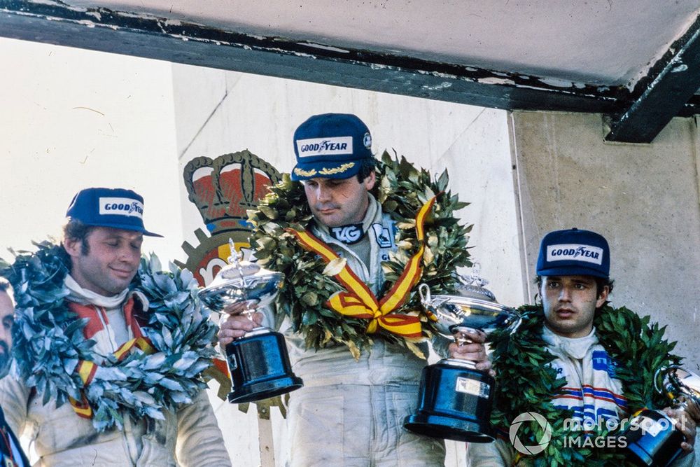 Jones on top of the 1980 Spanish GP podium - a race scratched from the F1 record book