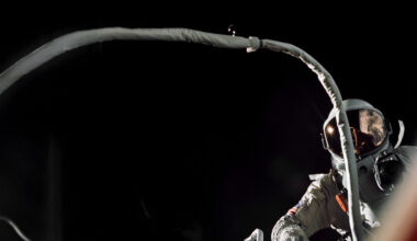 Gemini IX-A astronaut Gene Cernan is backdropped by the blackness of space during America’s second spacewalk on June 5, 1966. His umbilical drifts across the foreground, partially obscuring the view of the astronaut.