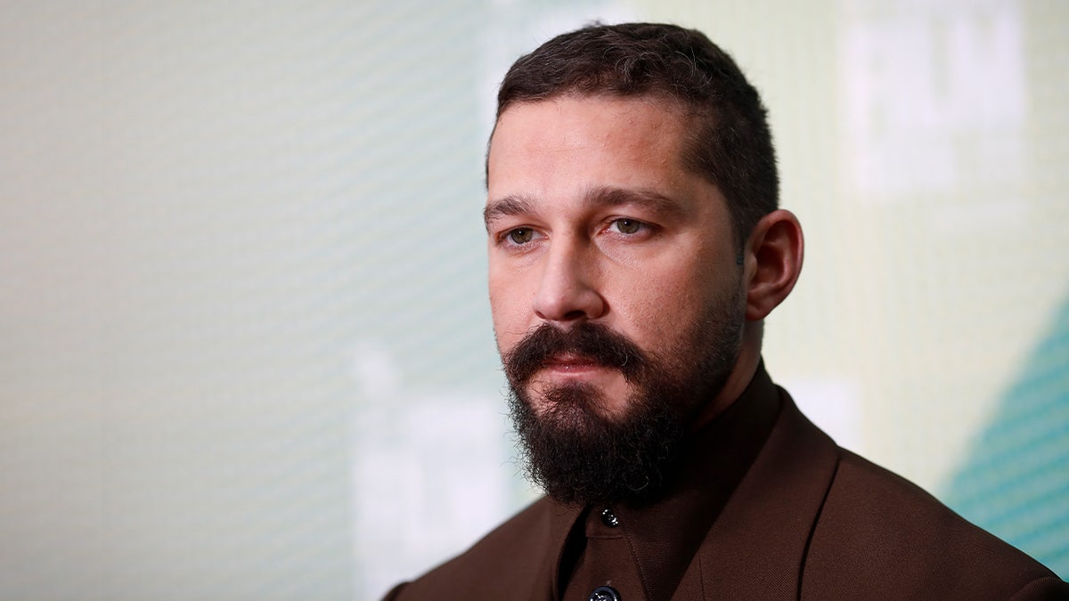 Actor Shia LaBeouf walking on the red carpet at a film premiere in London