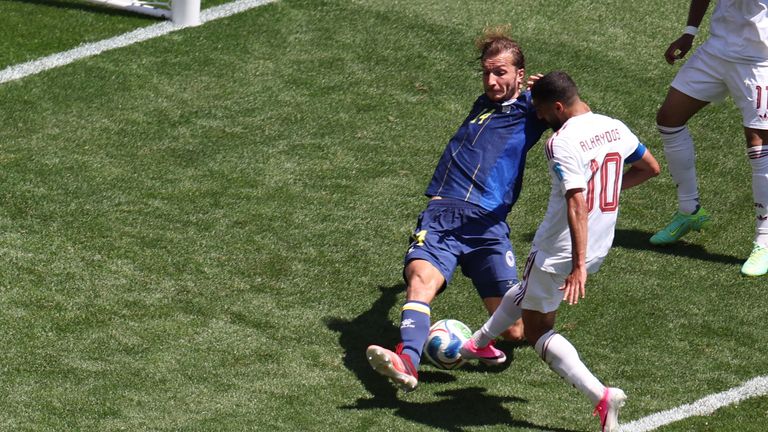 Qatar's Hassan Alhaydos (10) scores during the World Cup Group B soccer match between Bosnia and Qatar in Seattle, Wednesday, June 24, 2026. (AP Photo/Maddy Grassy)