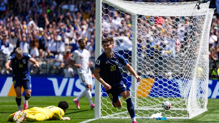 Bosnia's Esmir Bajraktarevic, right, celebrates after Qatar's Sultan Albrake scored an own goal during the World Cup Group B soccer match in Seattle, Wednesday, June 24, 2026. (AP Photo/Lindsey Wasson)