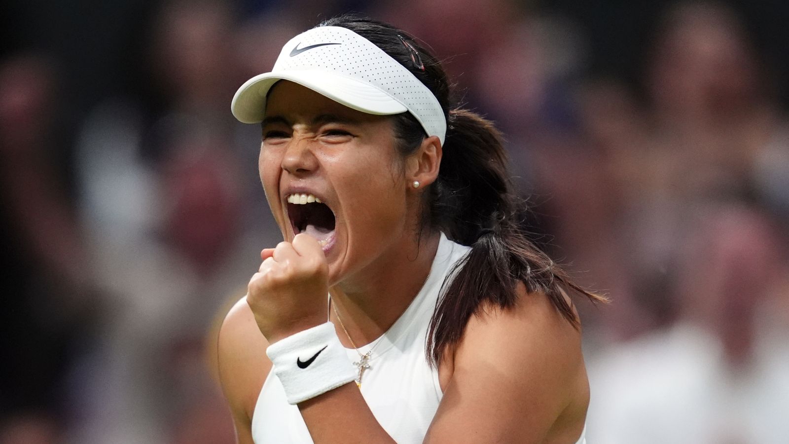 Emma Raducanu reacts during her match against Aryna Sabalenka on day five of the 2025 Wimbledon Championships at the All England Lawn Tennis