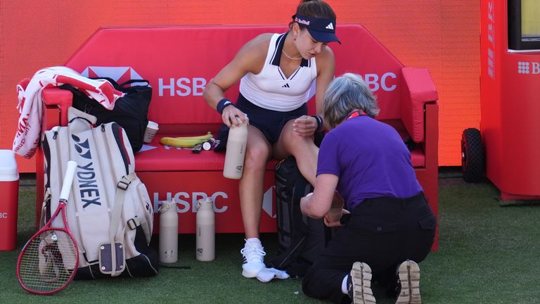 Iva Jovic receives treatment during her Queen's Club semi-final defeat to Emma Raducanu