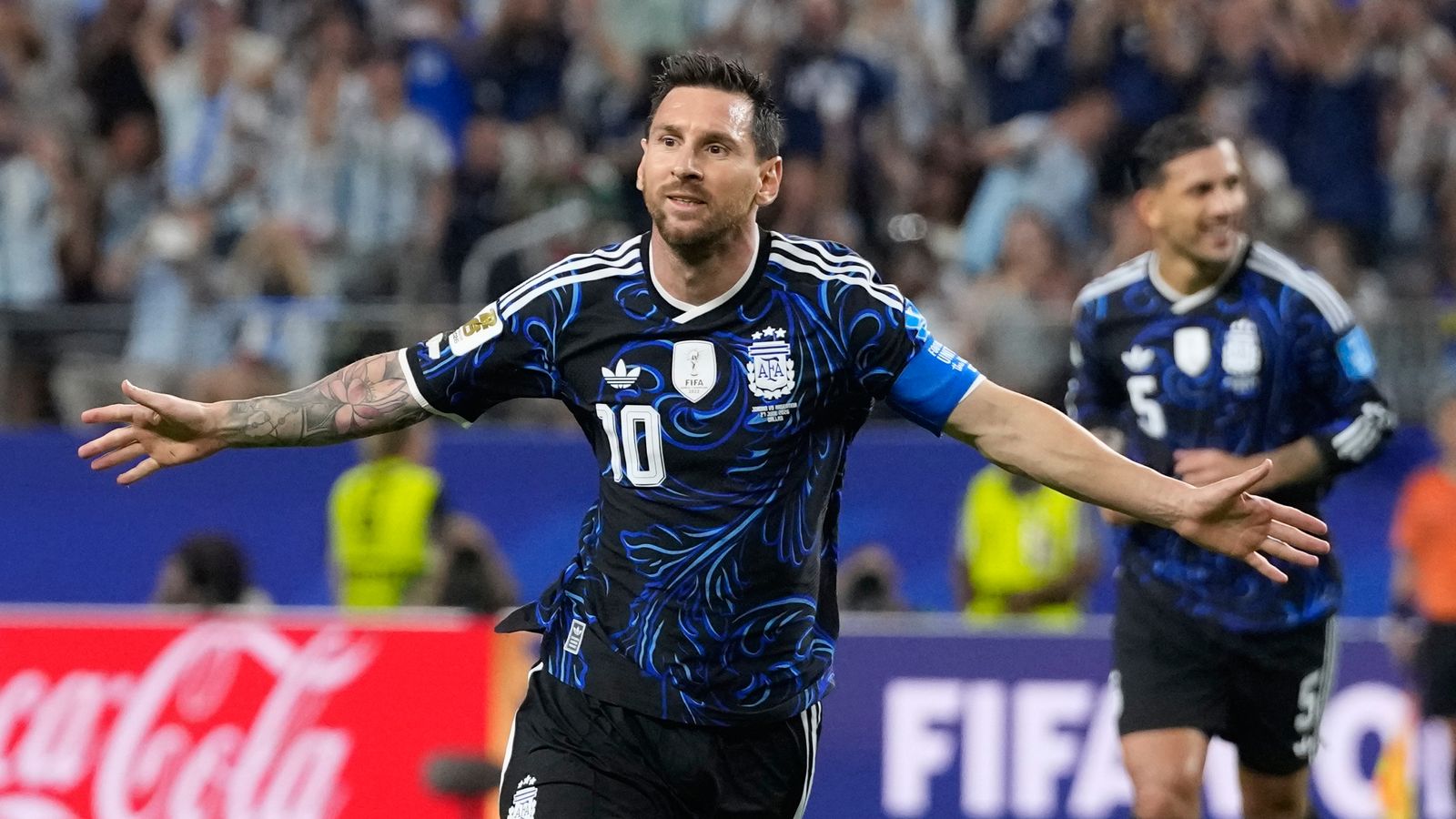 Argentina's Lionel Messi celebrates scoring during the World Cup Group J match against Jordan in Dallas