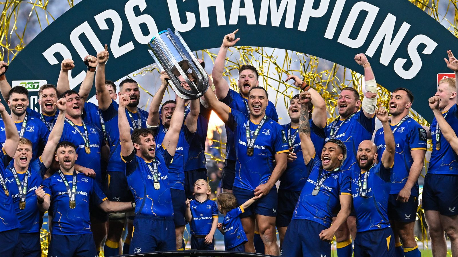 Leinster players Caelan Doris, Luke McGrath and James Lowe lift the trophy after the United Rugby Championship final