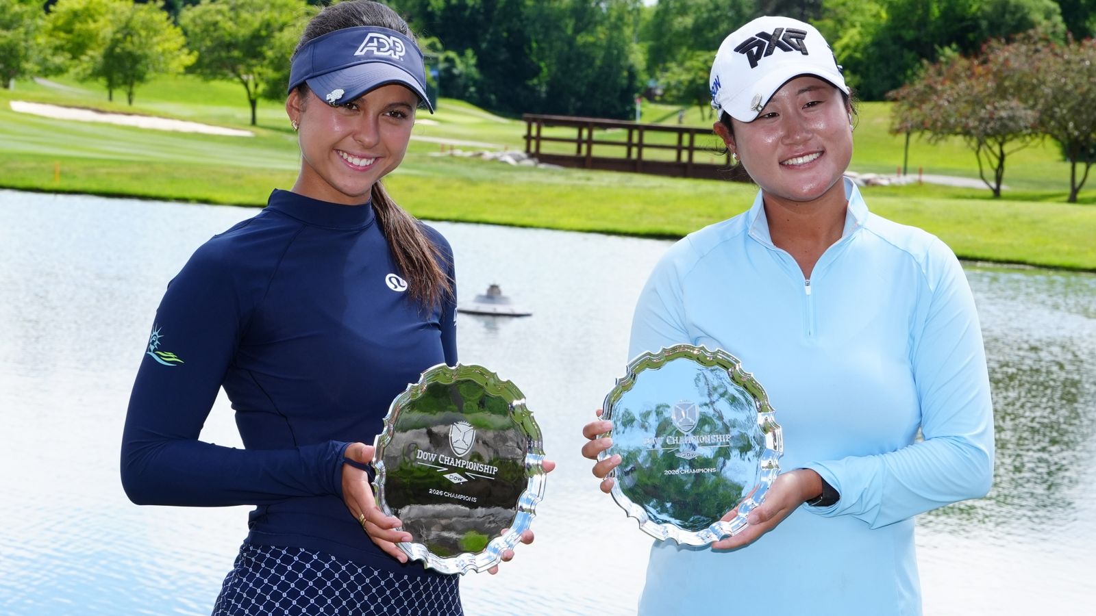 Yana Wilson and Gina Kim pose with the trophies after winning the LPGA Dow Championship (Icon Sportswire via AP Images)