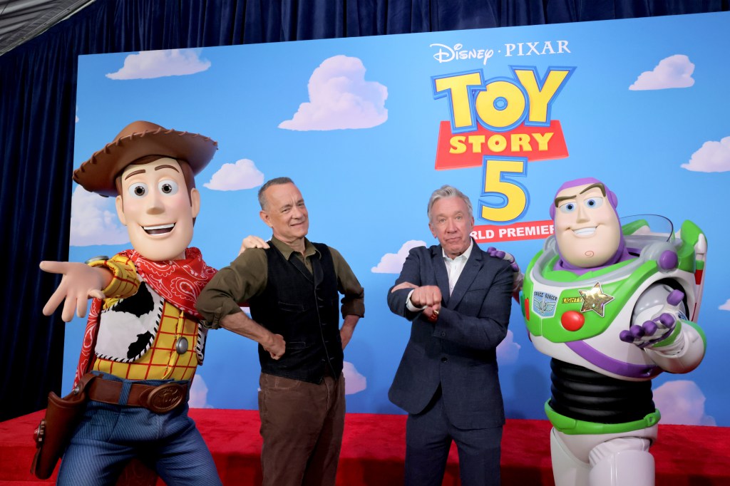 Woody, Tom Hanks, Tim Allen and Buzz Lightyear at the "Toy Story 5" premiere