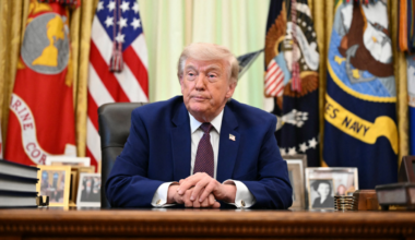 President Donald Trump urges MLB to institute a salary cap