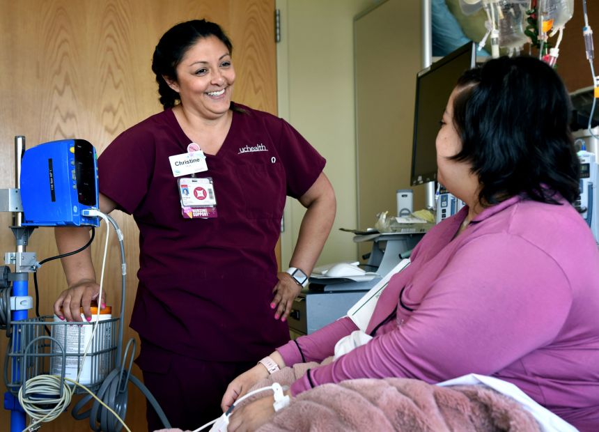 Christine Potter works as a patient care assistant in the bone marrow transplant unit at UCHealth University of Colorado Hospital. She is pursuing a Bachelor of Science in Nursing degree from Regis University through the UCHealth Ascend Career Program. (CNN blurred portions of the image to protect individuals' privacy)